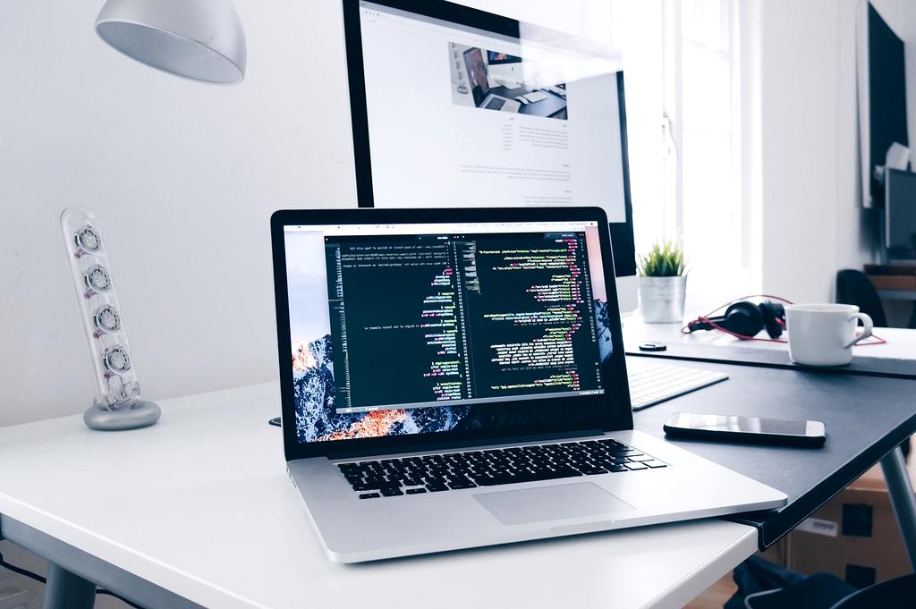 Laptop screen displaying update settings with scheduled installation options